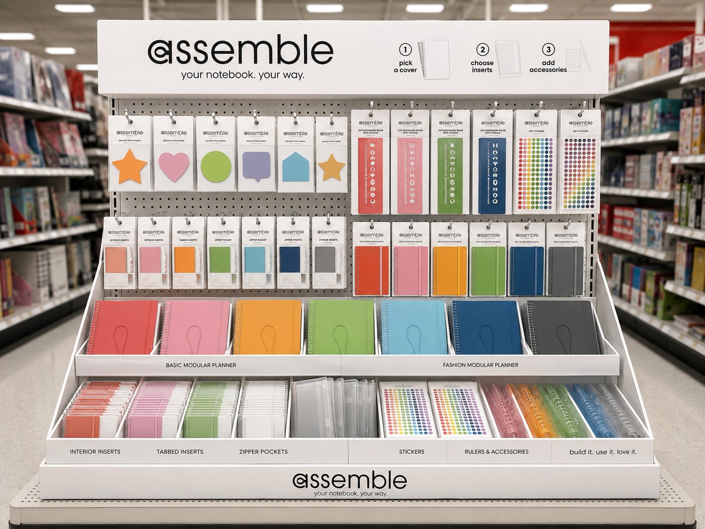 Assemble — your notebook, your way. Branded retail display with modular covers, inserts, and accessories.