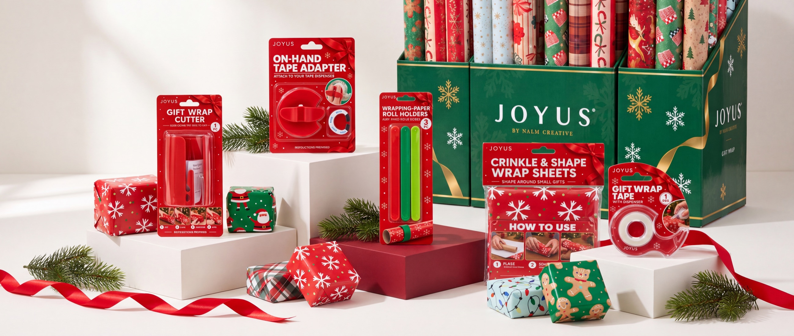 Joyus gift wrapping accessories with the green Joyus gift wrap display.