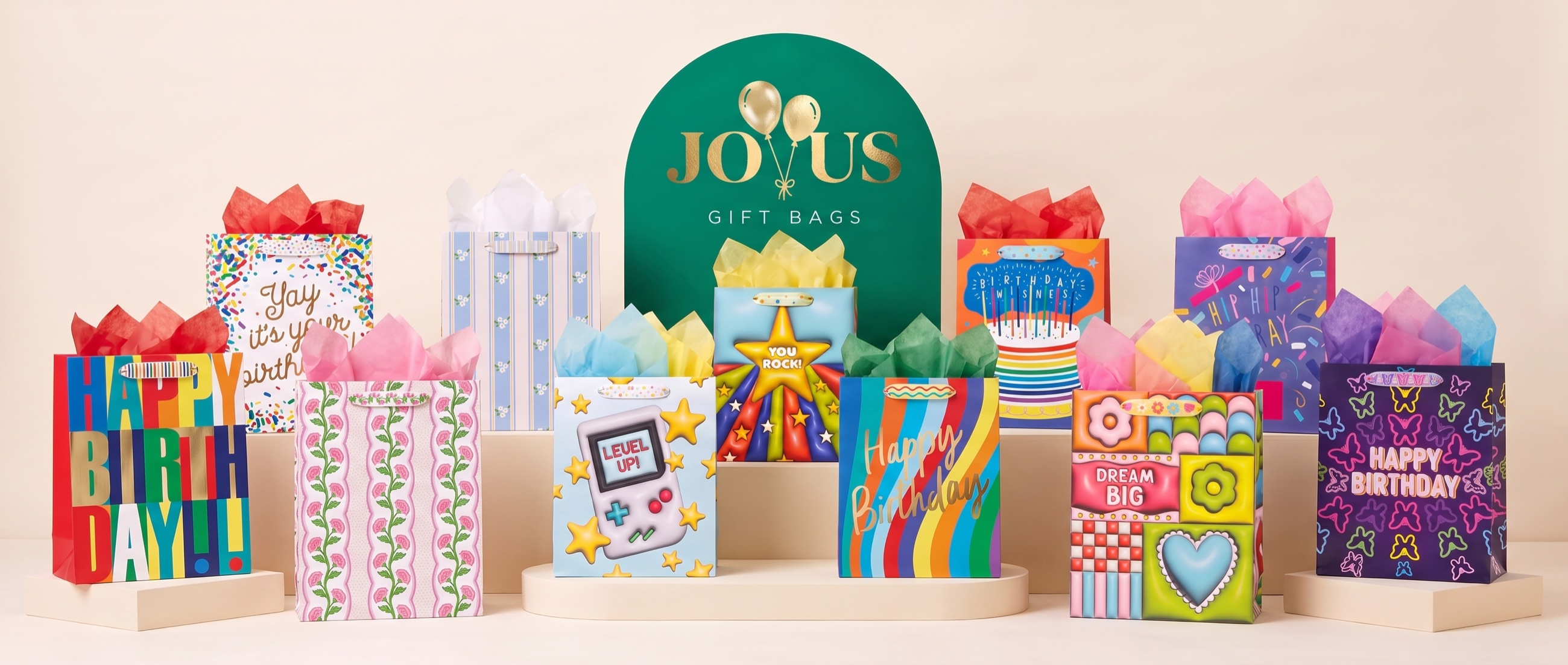 Joyus Everyday gift bags with printed handles in birthday, floral and tween designs.